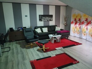 Apartment, Balcony | Living area | 50-inch Smart TV with satellite channels, TV - Boardinghouse Wolfsburg (Rühen)