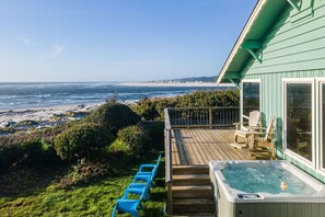 Enjoy the ocean front hot tub and deck from this amazing house!