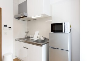 Fridge, microwave, stovetop, cookware/dishes/utensils