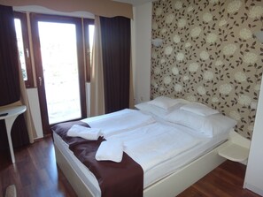 Een kluis op de kamer, gratis wifi, beddengoed