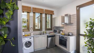 Vila | Cozinha privada | Geladeira, micro-ondas, fogão, cooktop