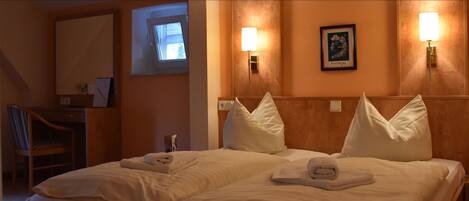 Desk, blackout curtains, rollaway beds, free WiFi