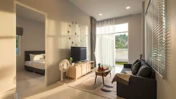 The Haven Krabi Delight Home 2 BDR | Zona de estar | Smart TV de 50 pulgadas con canales por satélite