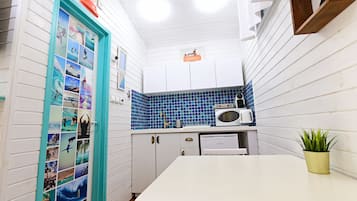 chalet with private garden | Private kitchen | Fridge, microwave, stovetop, espresso maker