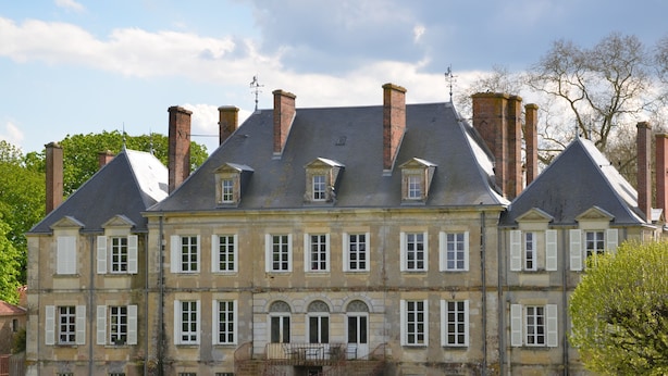 A large, historic building with multiple windows and a central entrance. - Château des Noces (Bazoges-en-Pareds)