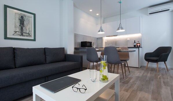 Apartemen, 1 kamar tidur | Area keluarga | TV layar datar dan pemutar DVD