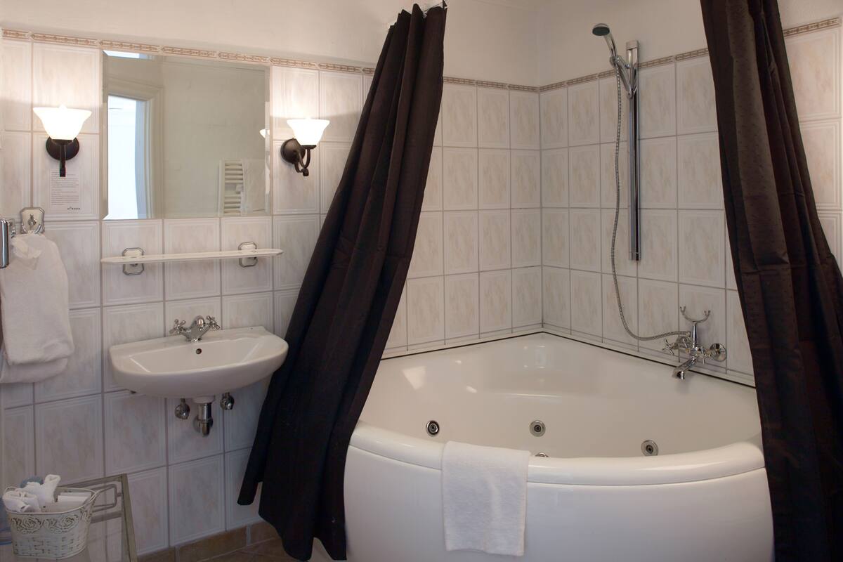 junior suite, jetted tub | bathroom sink