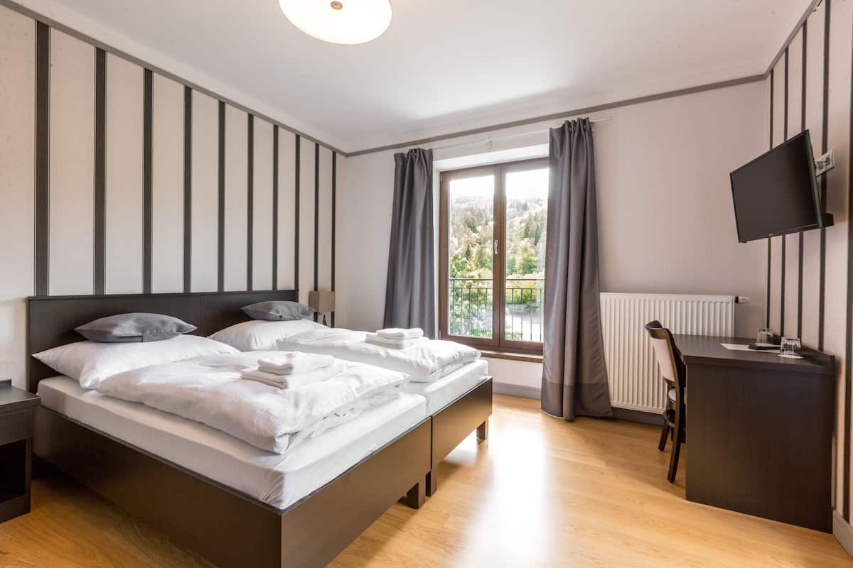 Deluxe Double Room, Terrace, River View | Hypo-allergenic bedding available, in-room safe, blackout drapes