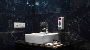 Standard Suite | Bathroom | Shower, rainfall showerhead, free toiletries, slippers