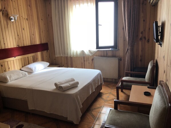 Desk, free WiFi, bed sheets