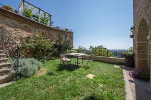 Habitació exclusiva, vistes al jardí | Terrassa o pati