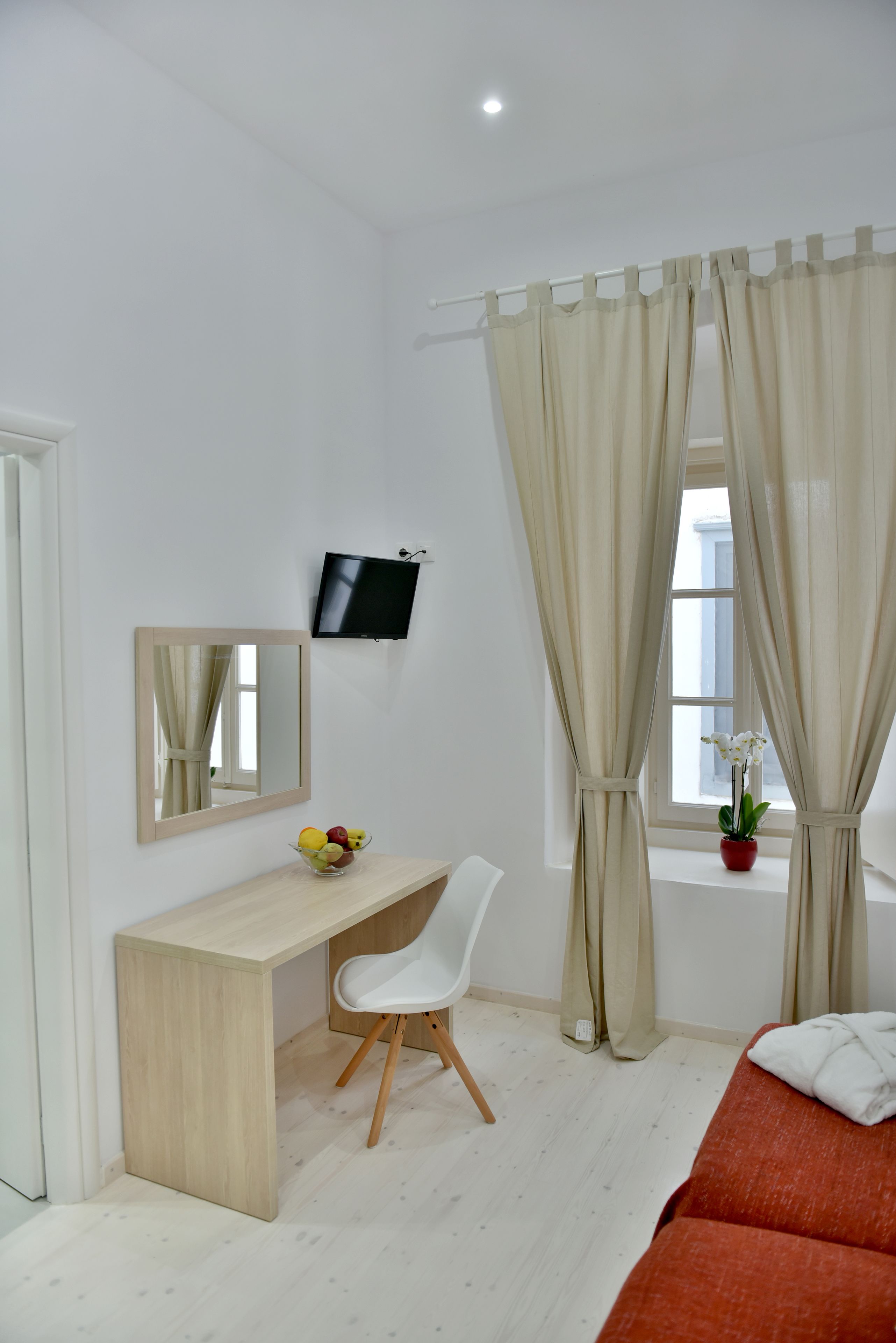 standard double room | living area | flat-screen tv