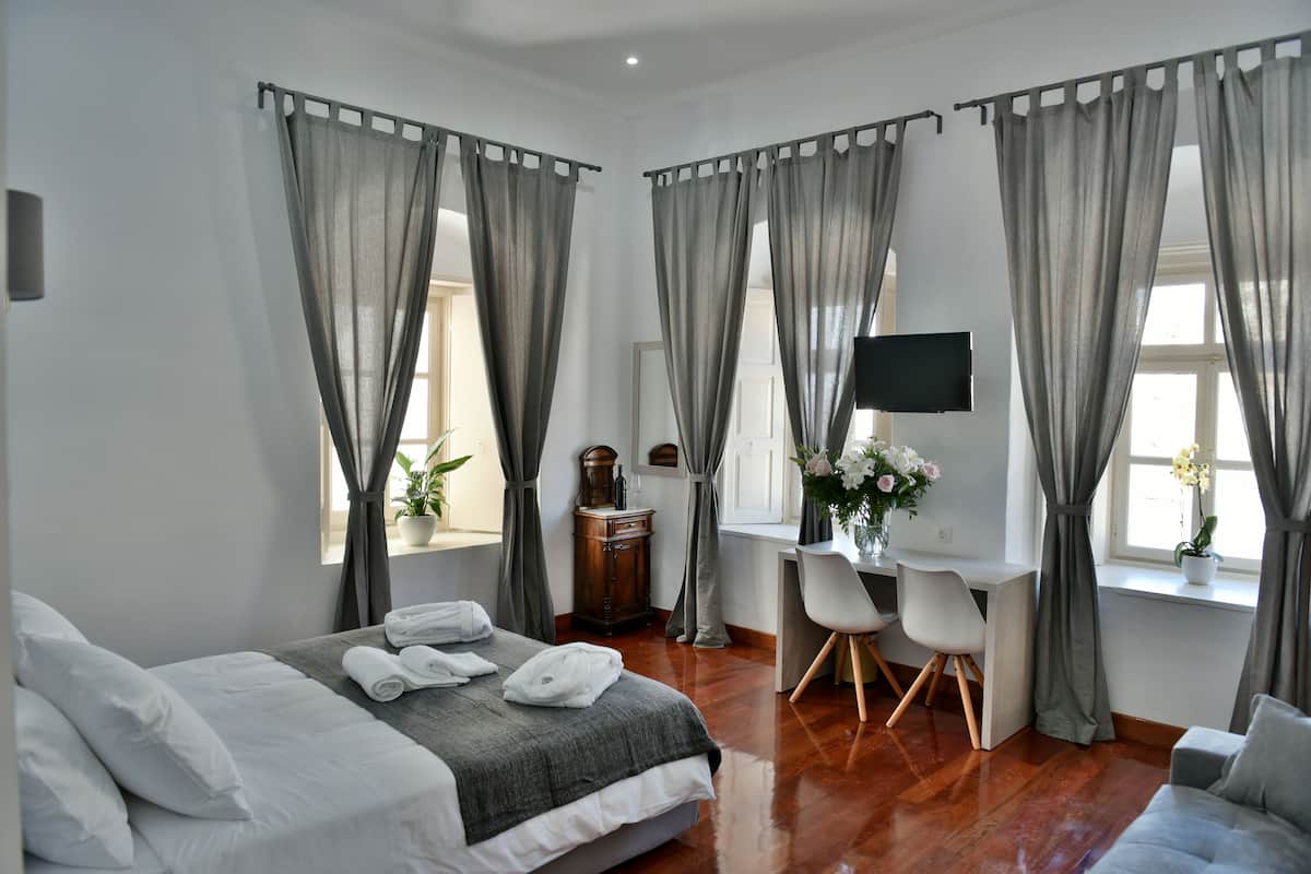 Junior Suite, Sea View | Minibar, desk, iron/ironing board, free WiFi