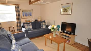 Cottage, 2 Bedrooms | Living room | Flat-screen TV, DVD player, iPod dock
