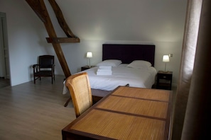 Desk, blackout curtains, free cots/infant beds, bed sheets