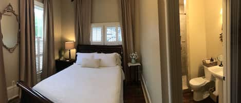 Deluxe Suite, 1 Queen Bed, Private Bathroom, Ground Floor | Minibar, individually decorated, individually furnished, soundproofing