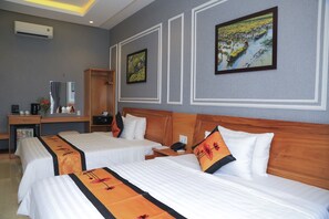 Family Bungalow, Garden View | Minibar, in-room safe, desk, blackout drapes - Van Kim Long (Sa Dec)