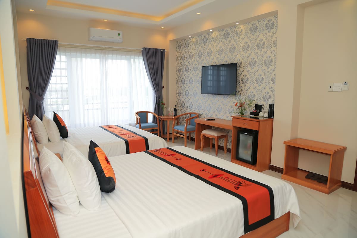 Premium Twin Room, City View | Minibar, in-room safe, desk, blackout curtains