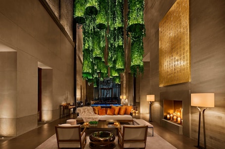 3 bars/lounges, rooftop bar, lobby lounge