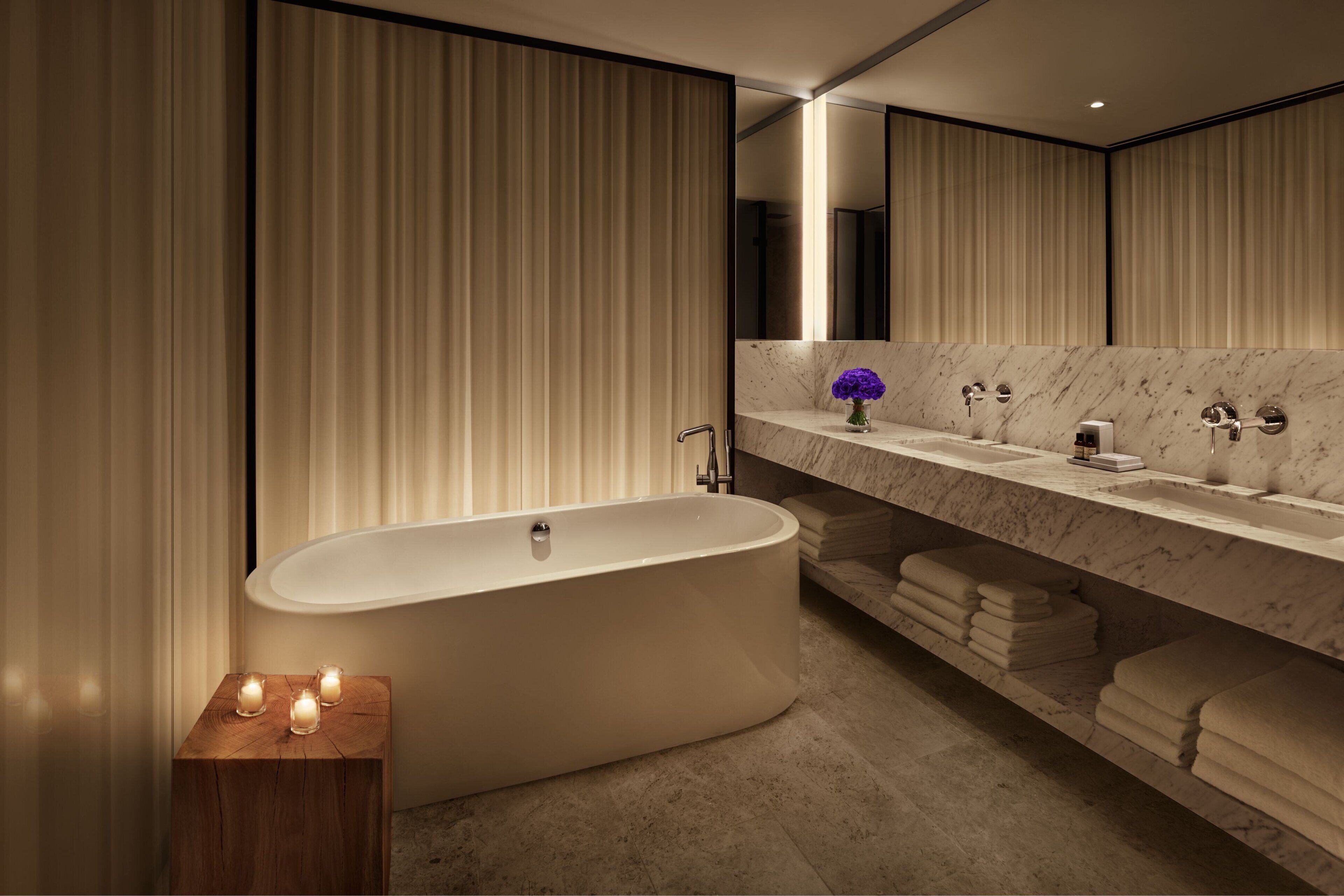 designer toiletries, hair dryer, bathrobes, slippers