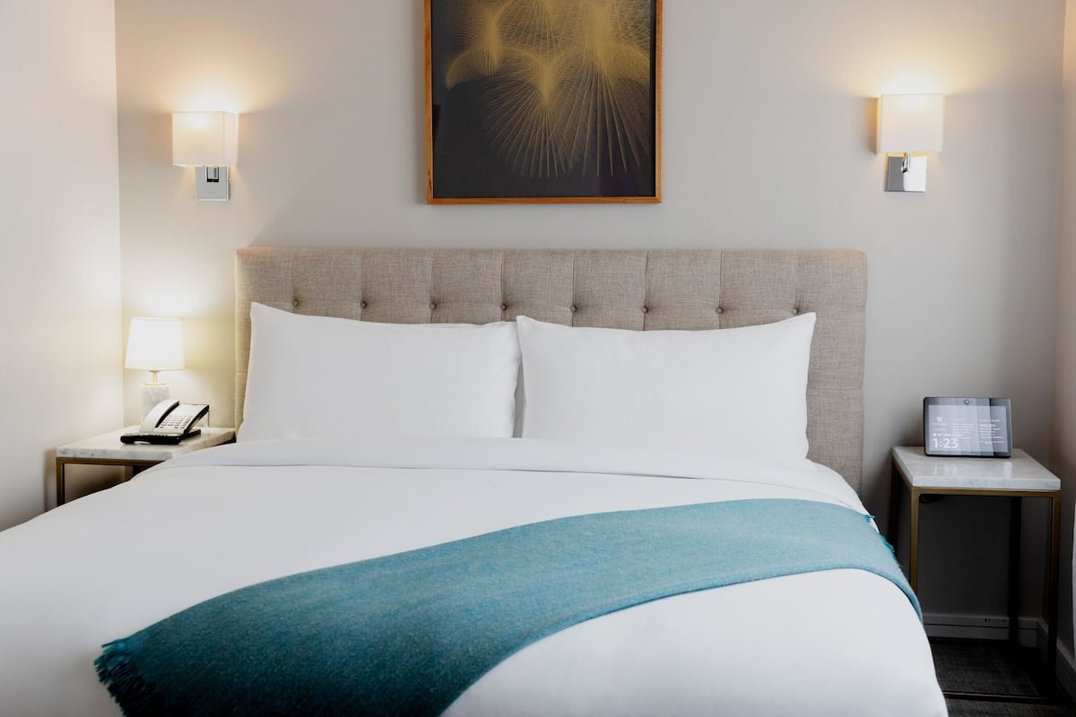 Premium bedding, down comforters, memory foam beds, minibar