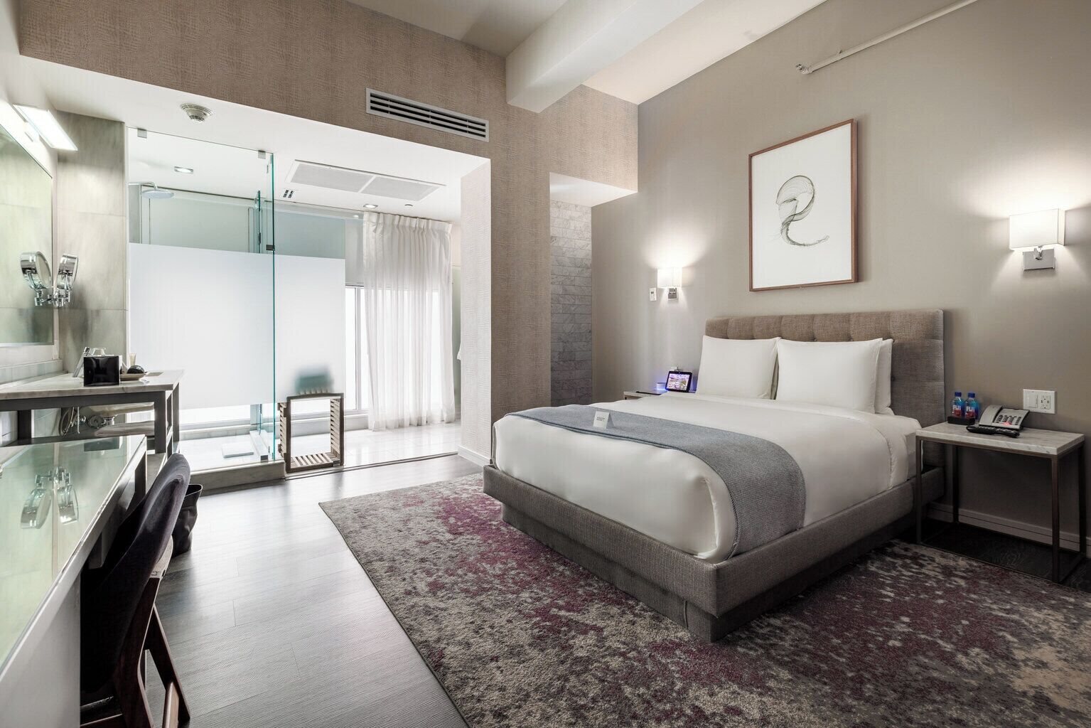 Premium bedding, down comforters, Tempur-Pedic beds, minibar