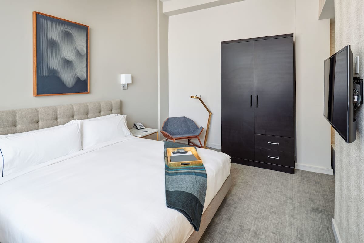 Premium bedding, down comforters, memory foam beds, minibar