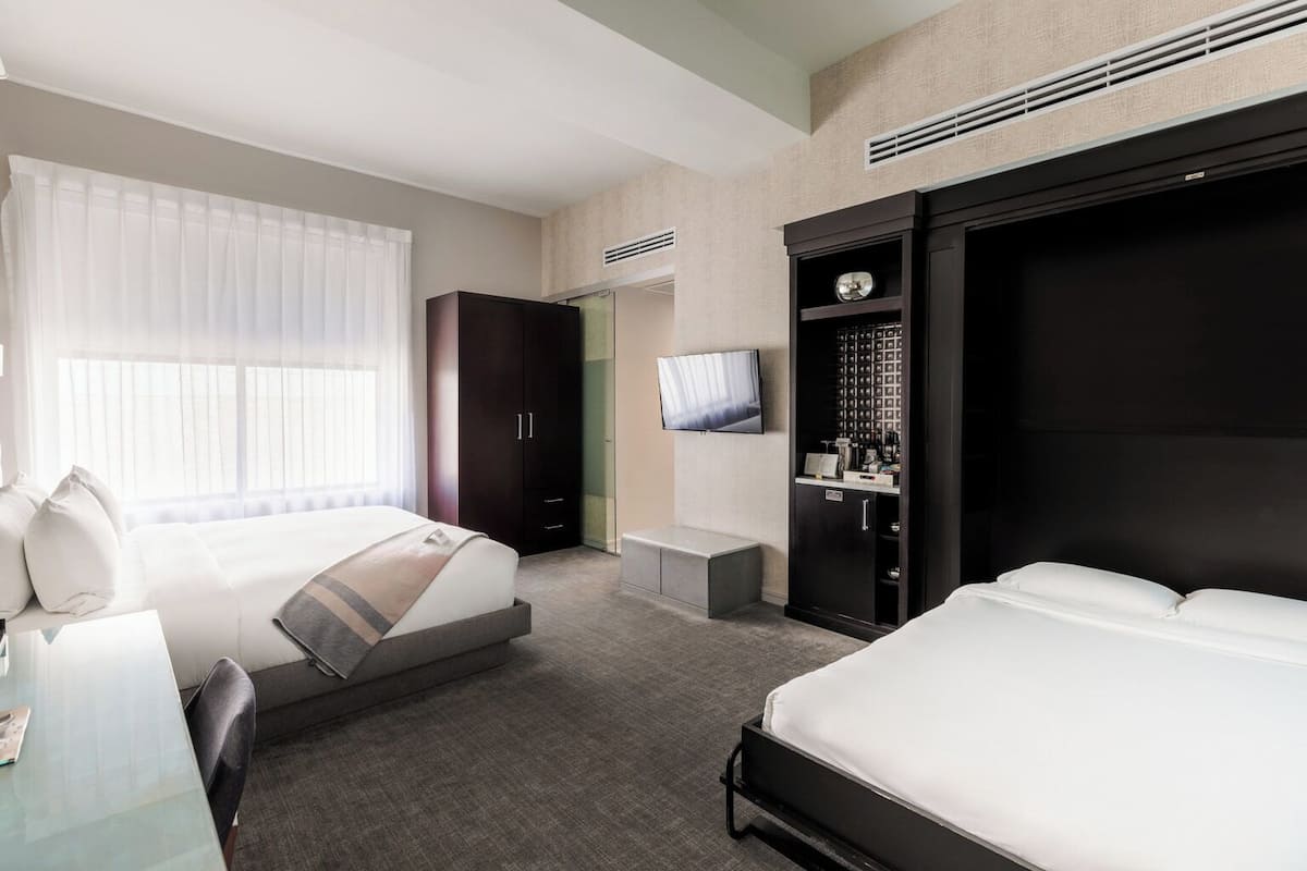 Premium bedding, down comforters, Tempur-Pedic beds, minibar