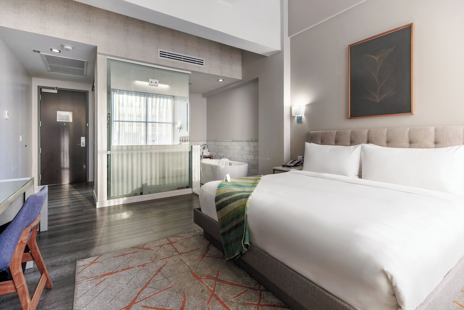 Premium bedding, down comforters, Tempur-Pedic beds, minibar