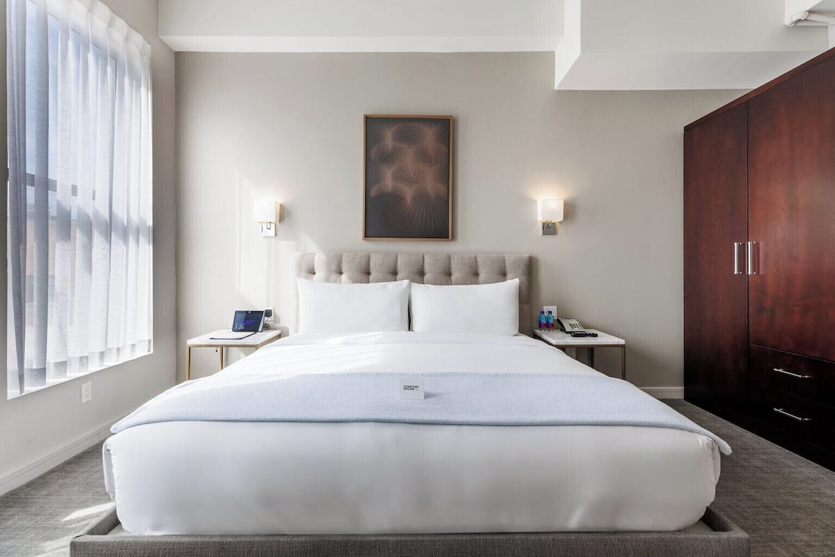 Premium bedding, down comforters, Tempur-Pedic beds, minibar