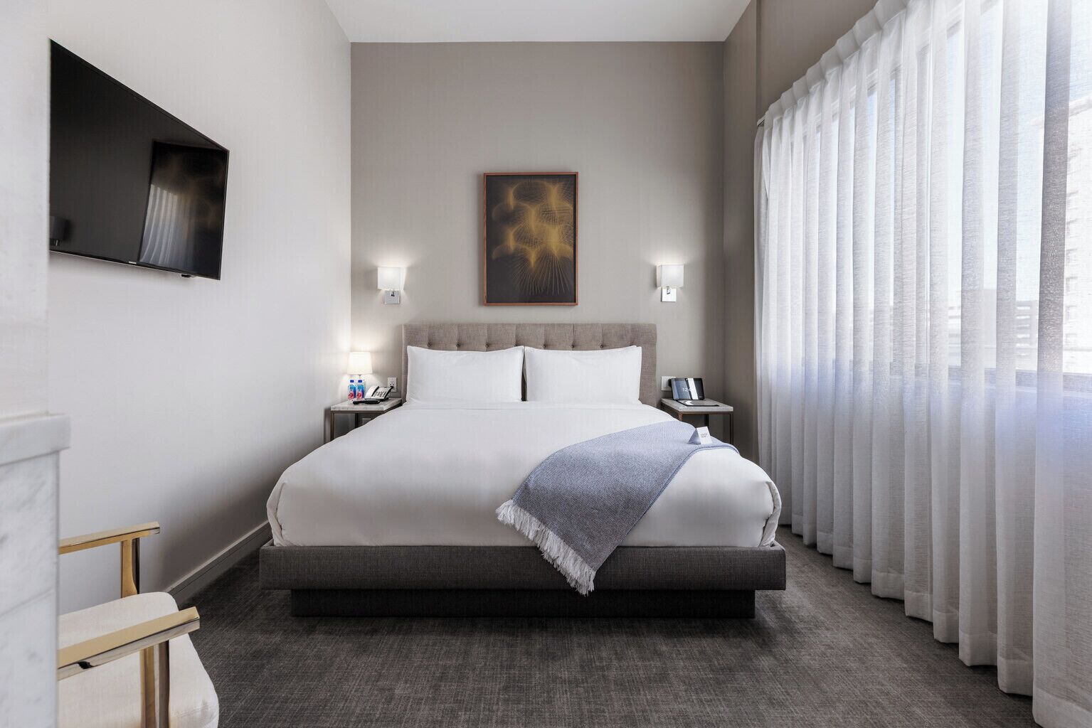 Premium bedding, down comforters, Tempur-Pedic beds, minibar