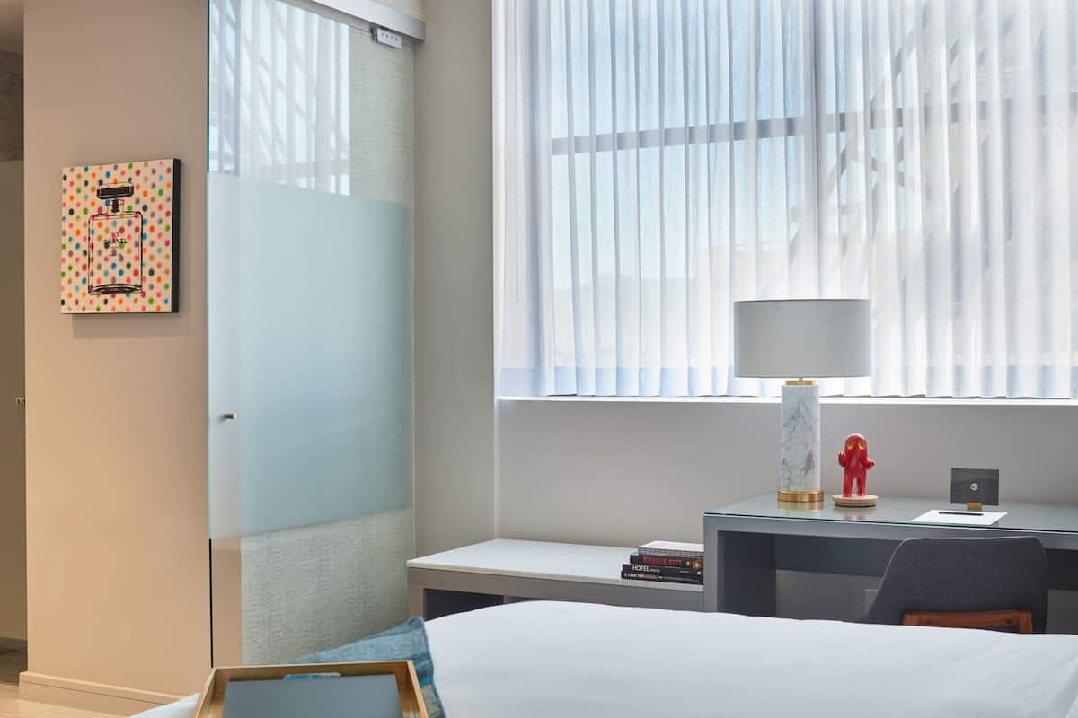 Premium bedding, down comforters, memory foam beds, minibar