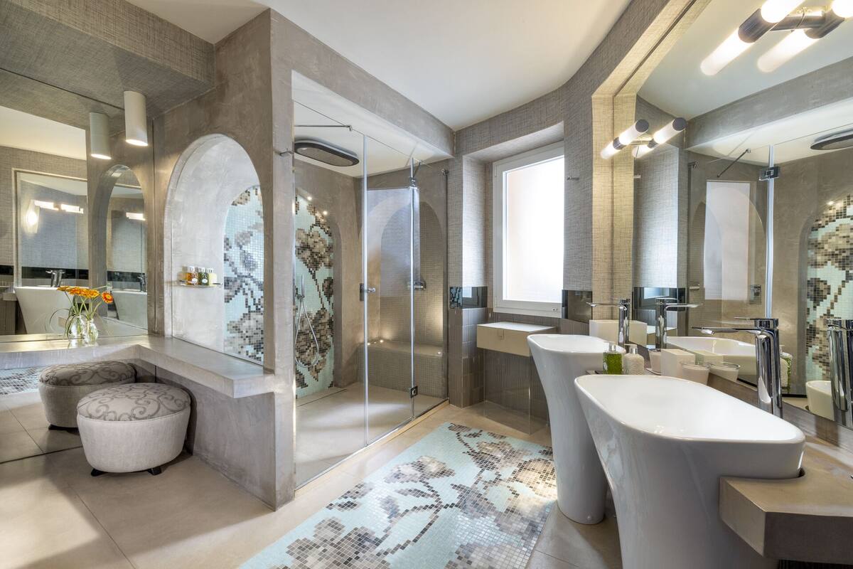 junior suite, balcony, sea view | bathroom | shower, designer toiletries, hair dryer, bathrobes