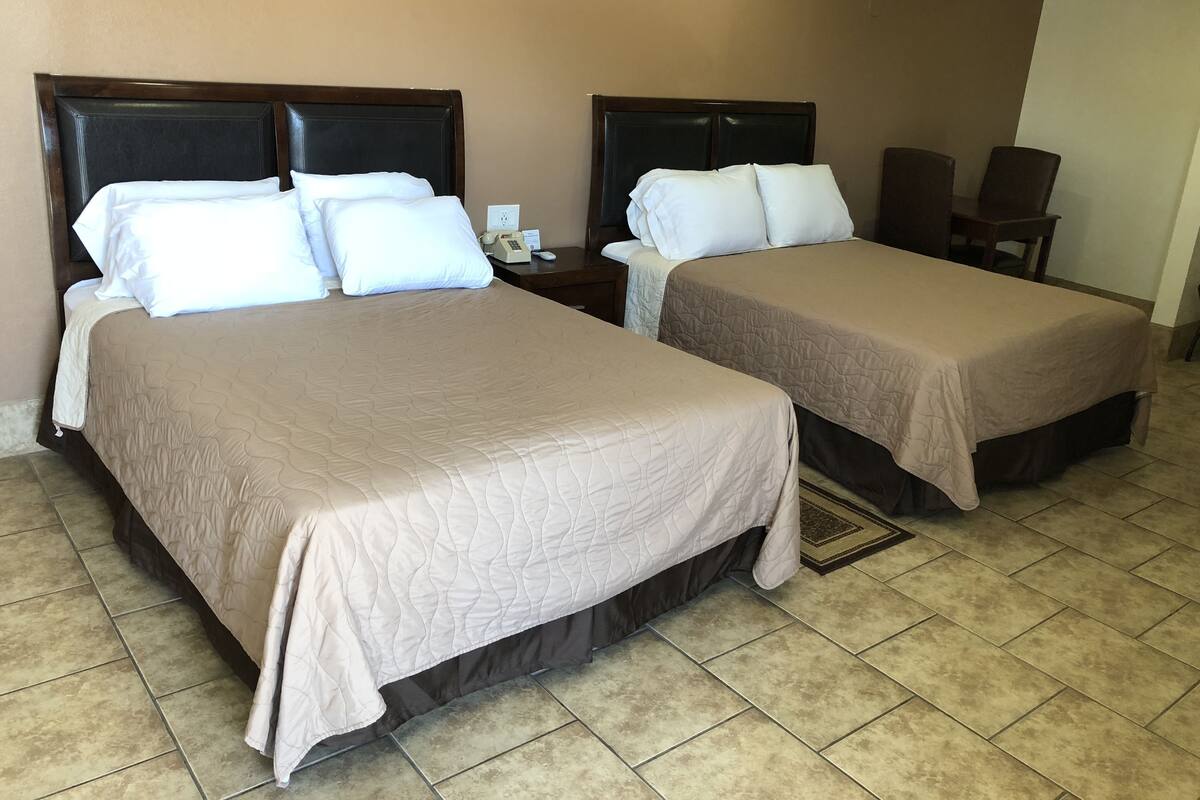Superior Double Room, 2 Queen Beds, Ground Floor | Iron/ironing board, WiFi (free), bed sheets
