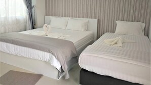 Habitación triple Deluxe | Wifi gratis
