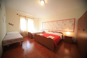 Standard Triple Room, 1 Bedroom | Premium bedding, in-room safe, individually decorated, desk