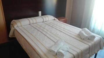 Blackout curtains, free WiFi, bed sheets