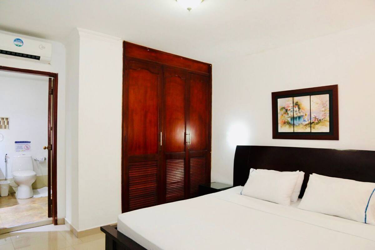 Desk, laptop workspace, free WiFi, bed sheets