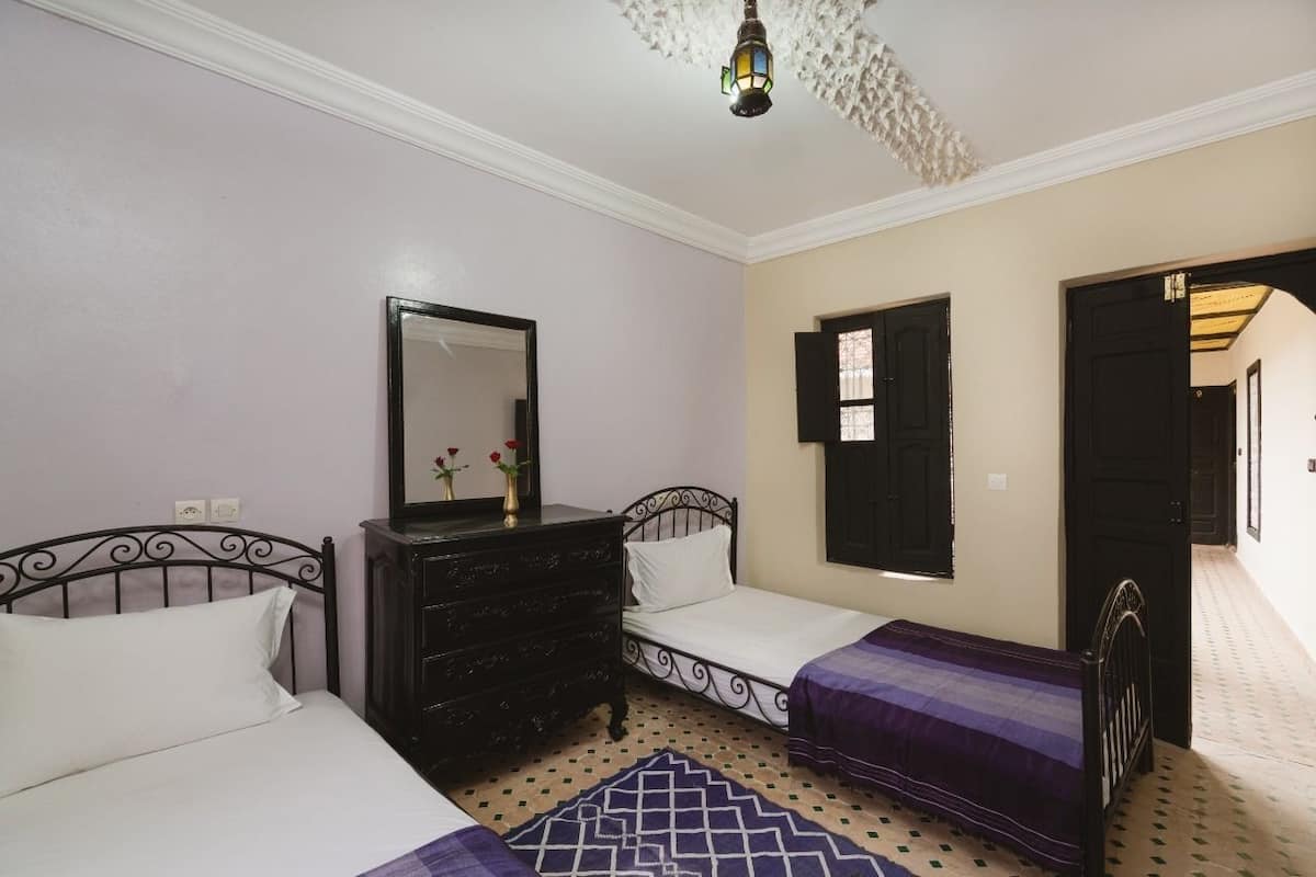 Twin Room | Blackout drapes, iron/ironing board (on request), cribs (free)