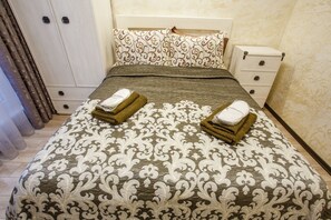 Habitación cuádruple familiar, 2 habitaciones, cocina, vista a la montaña | Ropa de cama de alta calidad y decoración personalizada 