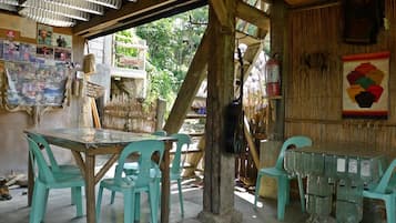 Breakfast, lunch, dinner served; local cuisine, alfresco dining