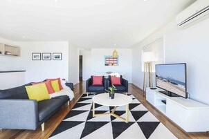 Deluxe Apartment, 2 Bedrooms, Ocean View | Desk, blackout drapes, iron/ironing board, cribs/infant beds