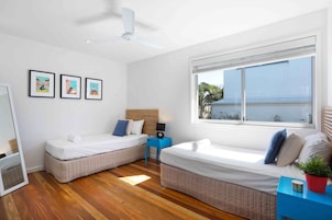 Deluxe Apartment, 2 Bedrooms, Ocean View | Desk, blackout drapes, iron/ironing board, cribs/infant beds