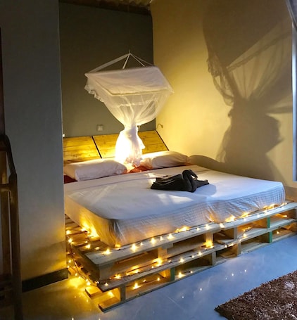 Triple Room, Garden View, Garden Area | 1 bedroom, soundproofing, rollaway beds, free WiFi. The Coconut