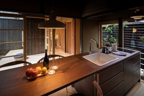 Private Vacation Home (KOUJIYA) | Private kitchen | Fridge, electric kettle - Hotel Koo OotsuHyakucho (Otsu)