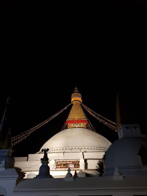 A large white building with a prominent dome and a spire. - Hotel Lotus Gems (Kathmandu)