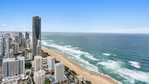 A coastal cityscape with high-rise buildings and a beach. - H'Residences - Q Stay (Surfers Paradise)