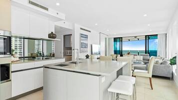Apartment, 3 Bedrooms | Private kitchen | Full-sized fridge, microwave, oven, stovetop