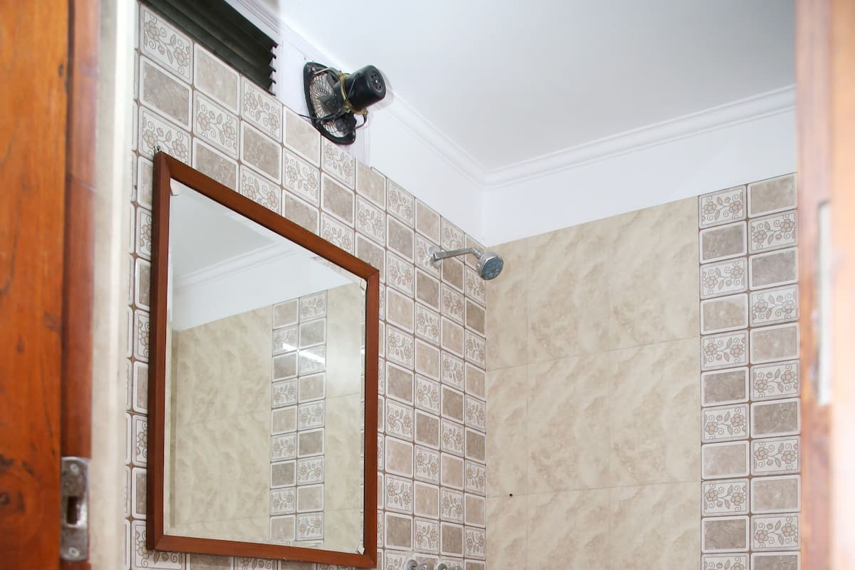 Habitación doble Deluxe | Baño | Regadera