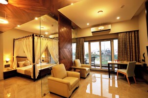 Suíte | Área de estar | TV de tela plana 32 polegadas com canais via satélite, TV